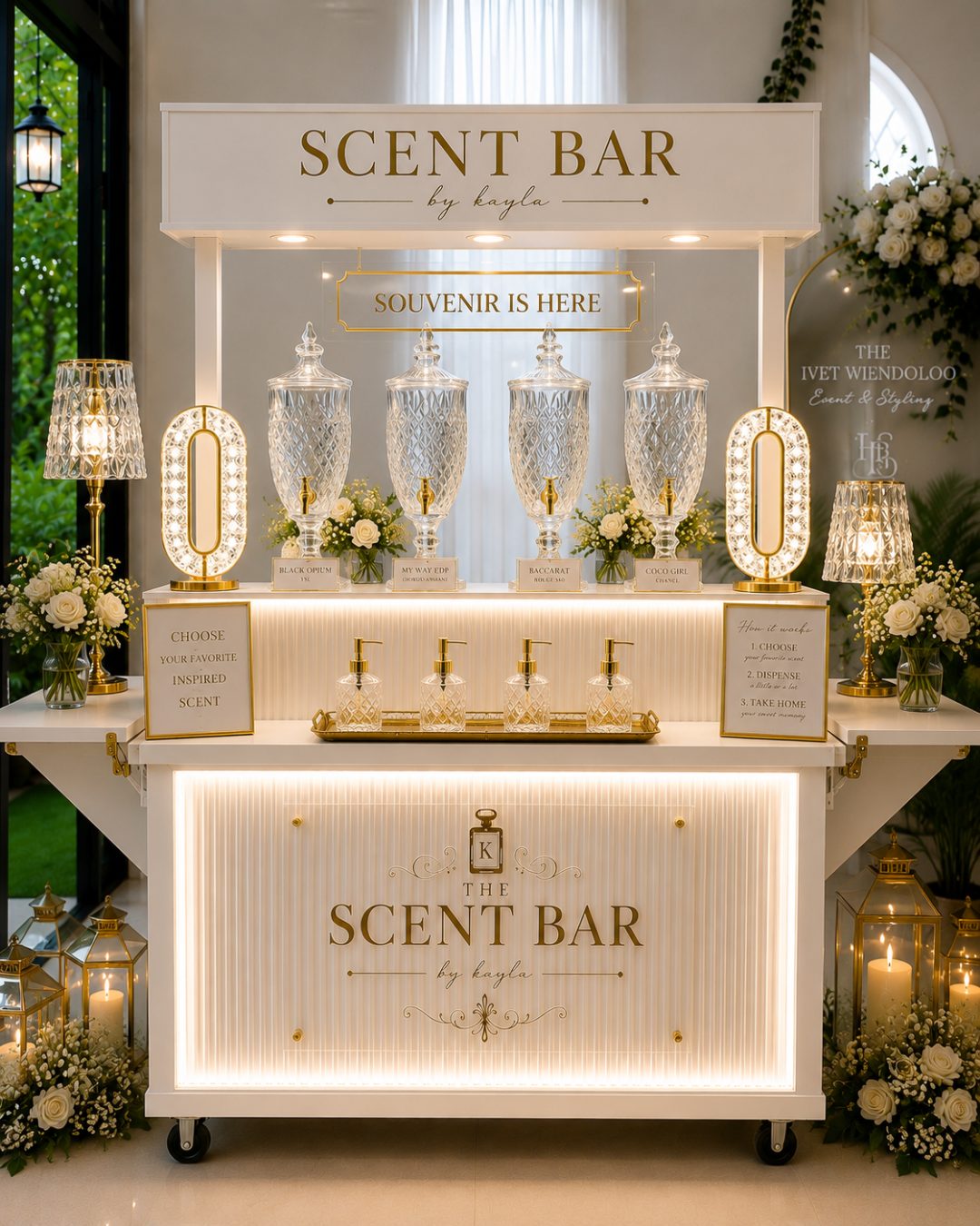 The Scent Bar by Kayla mobile perfume bar with crystal dispensers and gold signage